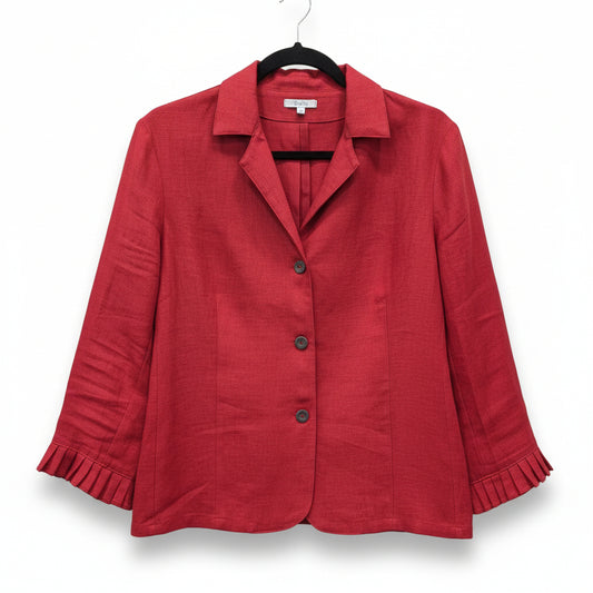 Red linen jacket on a hanger