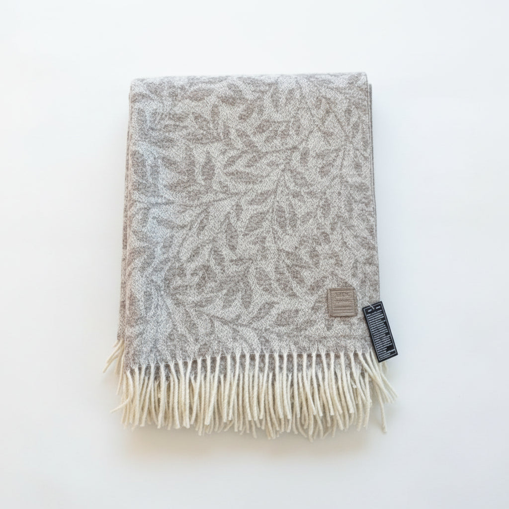 Beige patterned throw blanket with fringe 