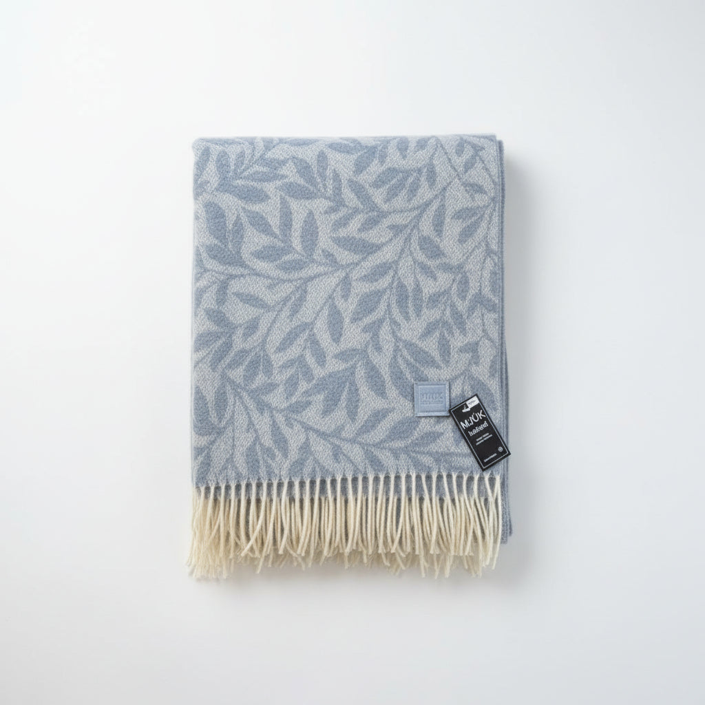 Blue patterned throw blanket with fringes 